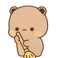 a brown teddy bear holding a yellow broom in its mouth
