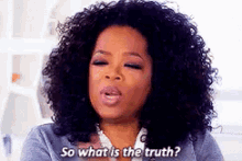 a woman with curly hair is asking so what is the truth