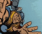 a cartoon of a man with a helmet on his head is being held by a large hand .