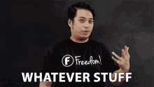 a man wearing a freedom t-shirt says " whatever stuff "