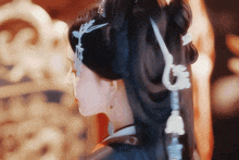 a close up of a woman 's hair with chinese writing