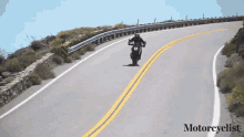 Downhill Motorcyclist GIF