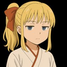 a girl with blonde hair and a red bow in her hair