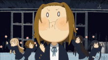 a group of anime girls are dancing in front of a building with a tbs logo on the bottom