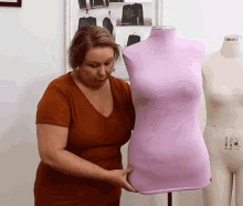 Carrying A Mannequin Adjusting GIF - Carrying A Mannequin Adjusting Positioning GIFs