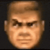a close up of a man 's face with a very angry expression .
