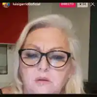 a close up of a woman wearing glasses and making a face