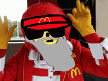 a mcdonald 's worker with a beard and sunglasses
