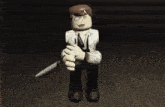 a cartoon character with a knife in his hand is sitting on a wooden floor