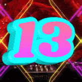 a pink and blue number 13 is surrounded by glowing lights