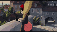 a cartoon of a girl with a broom and a black cat