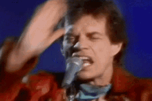 Mick Jagger The Rolling Stones GIF - Mick Jagger The Rolling Stones A Rock And A Hard Place GIFs