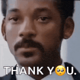 a man with a sad face and the words thank you u.