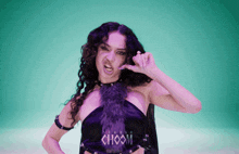a woman in a purple dress with choom written on it
