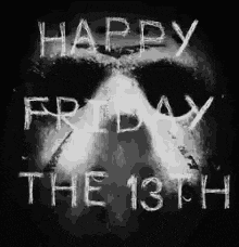 a black and white photo of a person 's face with the words `` happy friday the 13th '' written in white chalk .