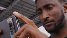 Taking A Picture Marques Brownlee GIF - Taking A Picture Marques Brownlee Capturing The Moment GIFs