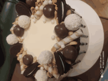 a shot on mi 9t shows a cake with oreos and nuts on it