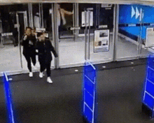 Store Glass Door Grand Entry GIF