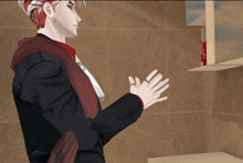 a man with red hair and a ring on his finger is standing in front of a shelf