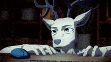 a cartoon deer is sitting at a desk with a keyboard and mouse