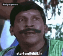 a man with a mustache is making a funny face with the words starttamilchat.in written on the bottom .