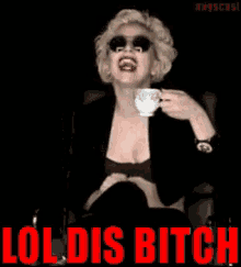 a woman is holding a cup of coffee with the words loldis bitch written in red