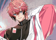a boy with red hair and blue eyes is wearing a black and white jacket