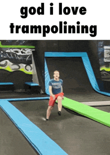 a man jumping on a trampoline with the words god i love trampolining above him