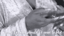 a black and white photo of a woman with the words yeah i really should 've gone to bed