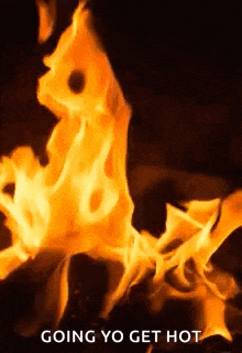 a fire is burning in a fireplace with the words `` going yo get hot '' written below it .