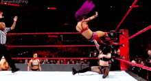 Paige Sasha Banks GIF - Paige Sasha Banks Rolling Sunset Flip Powerbomb GIFs