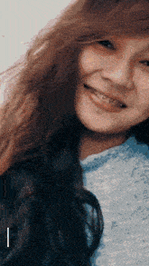 a girl with braces on her teeth is smiling