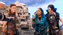 a girl with blue hair is blowing a kiss to a man