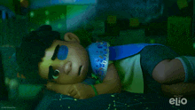 a cartoon character laying on a bed with the word elio on the bottom