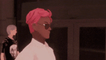 a man with pink hair is standing next to a woman .