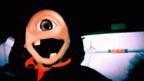 a person wearing a mask with one eye and a big smile on their face