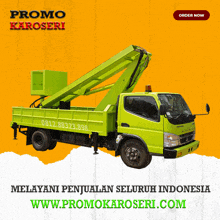 a green truck with a crane attached to it is advertising promo karoseri