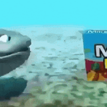 a box of mikes juice sits next to a cartoon character