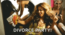a woman is sitting on a couch with a drink in her hand and the words divorce party written above her .