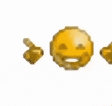 a yellow smiley face with two fingers pointing at it .