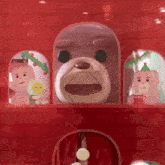 a stuffed animal in a glass dome with other stuffed animals in the background