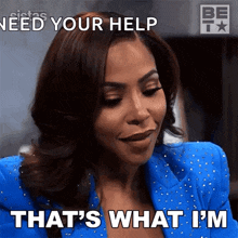 a woman in a blue jacket is saying that 's what i 'm