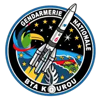 a logo for gendarmerie nationale bta kourou with a rocket