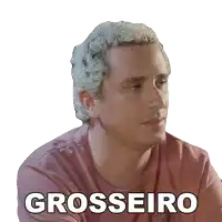 a man in a pink shirt with the word grosseiro on his face