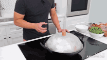 a man is cooking on a stove with the words made in animatica on the bottom right
