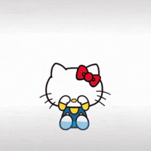 a blue hello kitty with a red bow is surrounded by words in a foreign language