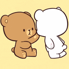 a brown teddy bear is touching the face of a white teddy bear .