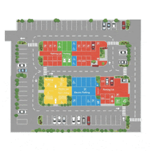 an aerial view of a parking lot with different colored sections