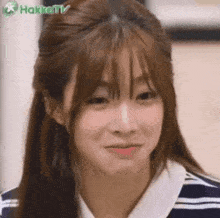 a close up of a woman making a funny face
