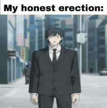a man in a suit and tie is standing on a city street with a caption that says my honest erection
